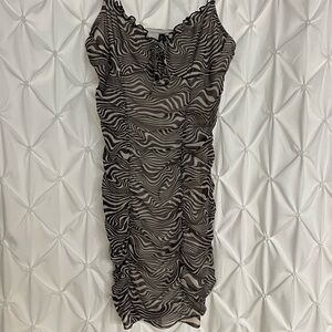 Body con ruffled, brown, and cream colored dress.